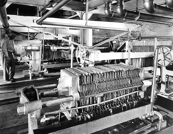 Man working on machinery in factory